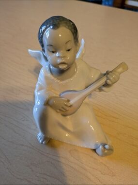 Lladro; Porcelain Angel Figurine Playing Lute - Cream and Light Brown